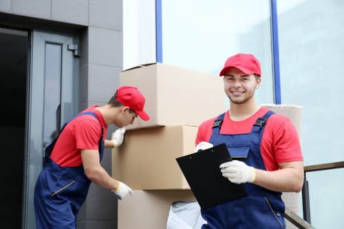 Van moving service with staff protecting items during loading in Paddington