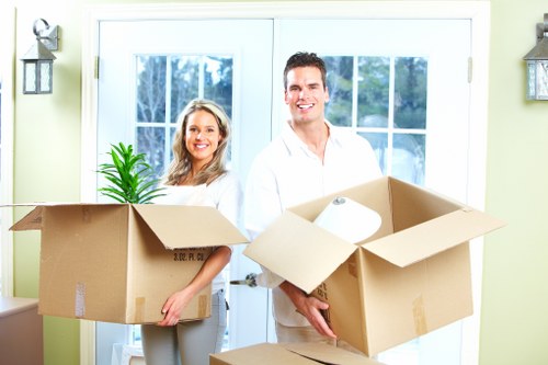 Packed boxes and moving equipment ready for a home relocation