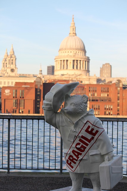 A moving van near canal-side apartments in Paddington Basin